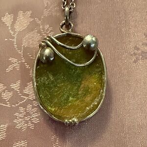 Elegant antique Green glass Pendant in a handmade setting